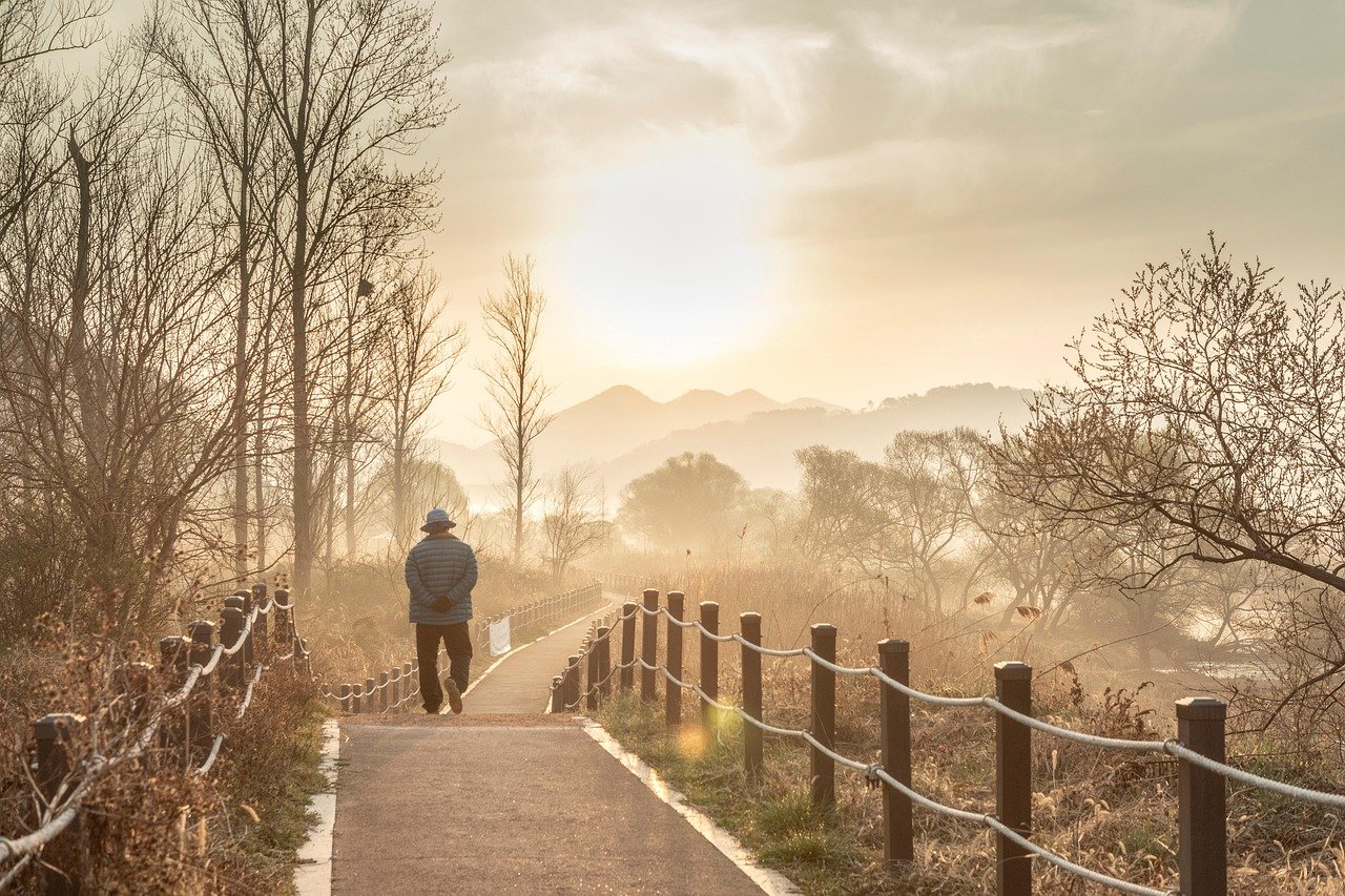 A man walking, illustrating the principle of walking as a great fitness tool.